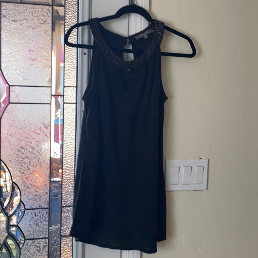 Black sleeveless blouse